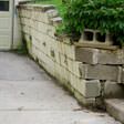 a collapsing retaining wall in Depew