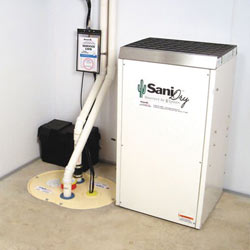 Sump pump system, dehumidifier, and basement wall panels installed during a sump pump installation in Angola