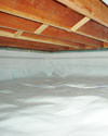 a moisture barrier installed on the walls and floors of a crawl space in Grand Island