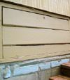 an old-fashioned crawl space door in Elma about to be replaced
