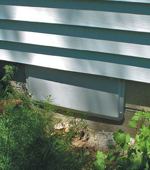 A gray crawl space vent cover in Lewiston