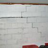 A buckling foundation wall in a Clarence home.