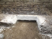 Preparing a foundation footing for helical pier installation in Henrietta