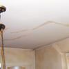 Drywall cracks in Lockport that were poorly patched and repaired.