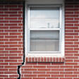 foundation cracks along a window in Henrietta