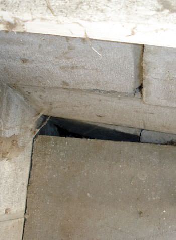 inward rotation of a foundation wall damaged by street creep in a garage in Attica