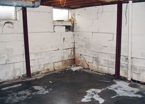 A failed, rusty i-beam foundation wall system installed in Newfane.