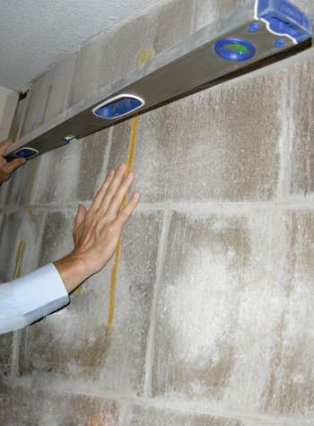 severe foundation wall failure symptoms of a basement wall in Cheektowaga, West Seneca, Dunkirk
