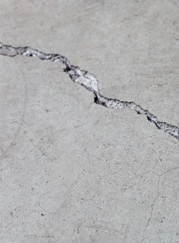 Pavers sinking into the ground and in need of mud jacking in Derby