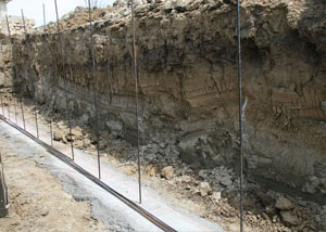 Soil layers exposed while excavating to construct a new foundation in Depew
