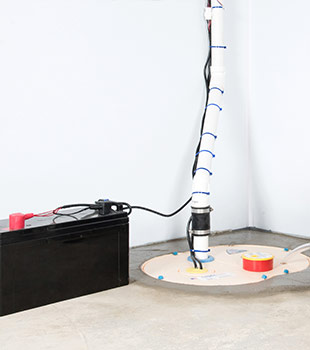 A sump pump installed in East Aurora by Frank's Basement Systems