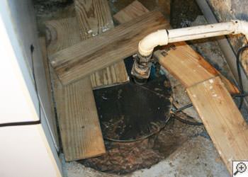 An ugly, clogged sump pump system in Hamburg, Western New York