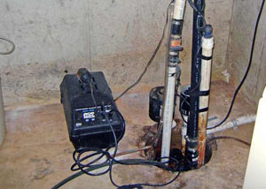 Pedestal sump pump system installed in a home in Alden