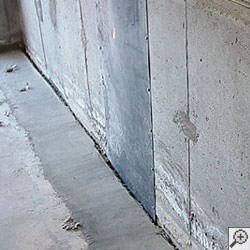 an ugly basement weeping tile drainage system that's clogged and not working in Tonawanda.