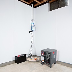 Sump pump system, dehumidifier, and basement wall panels installed during a sump pump installation in East Amherst